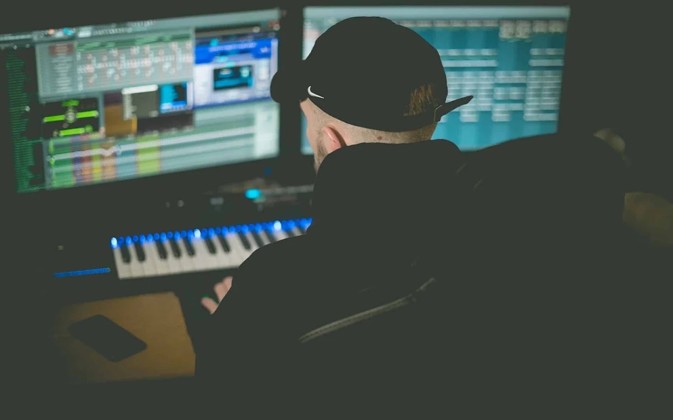 Producer working on a track in the studio